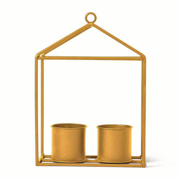 Et hængende potteskjuler ophæng med pladser 2 til planter, som ligner et drivhus i guld.